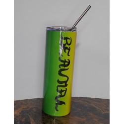 20 oz skinny rainbow tumbler showing yellow to green side of the design with lid and straw in